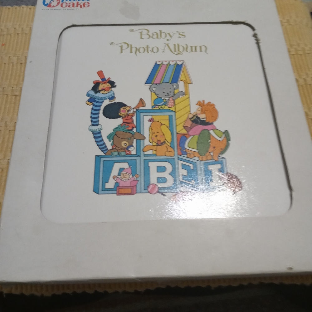 New in box baby photo album